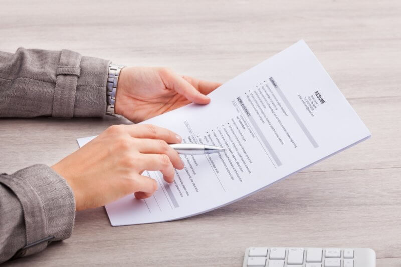 Businesswoman Holding Contract Paper